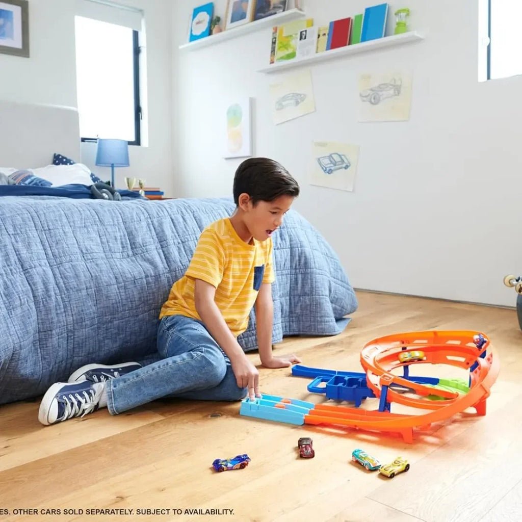 Hot Wheels Whip Around Raceway HTK17 – Looping Circuit Track Set with Dual Launchers & Crash Zone | Includes 2 Cars | Foldable Carry Case - Naivri