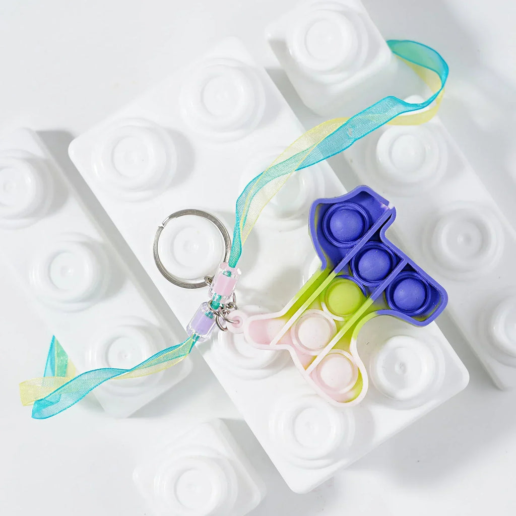 ilearnngrow PopIt Rakhi multiple shapes - Naivri