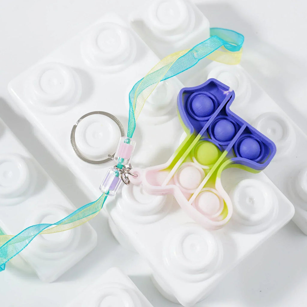 ilearnngrow PopIt Rakhi multiple shapes - Naivri