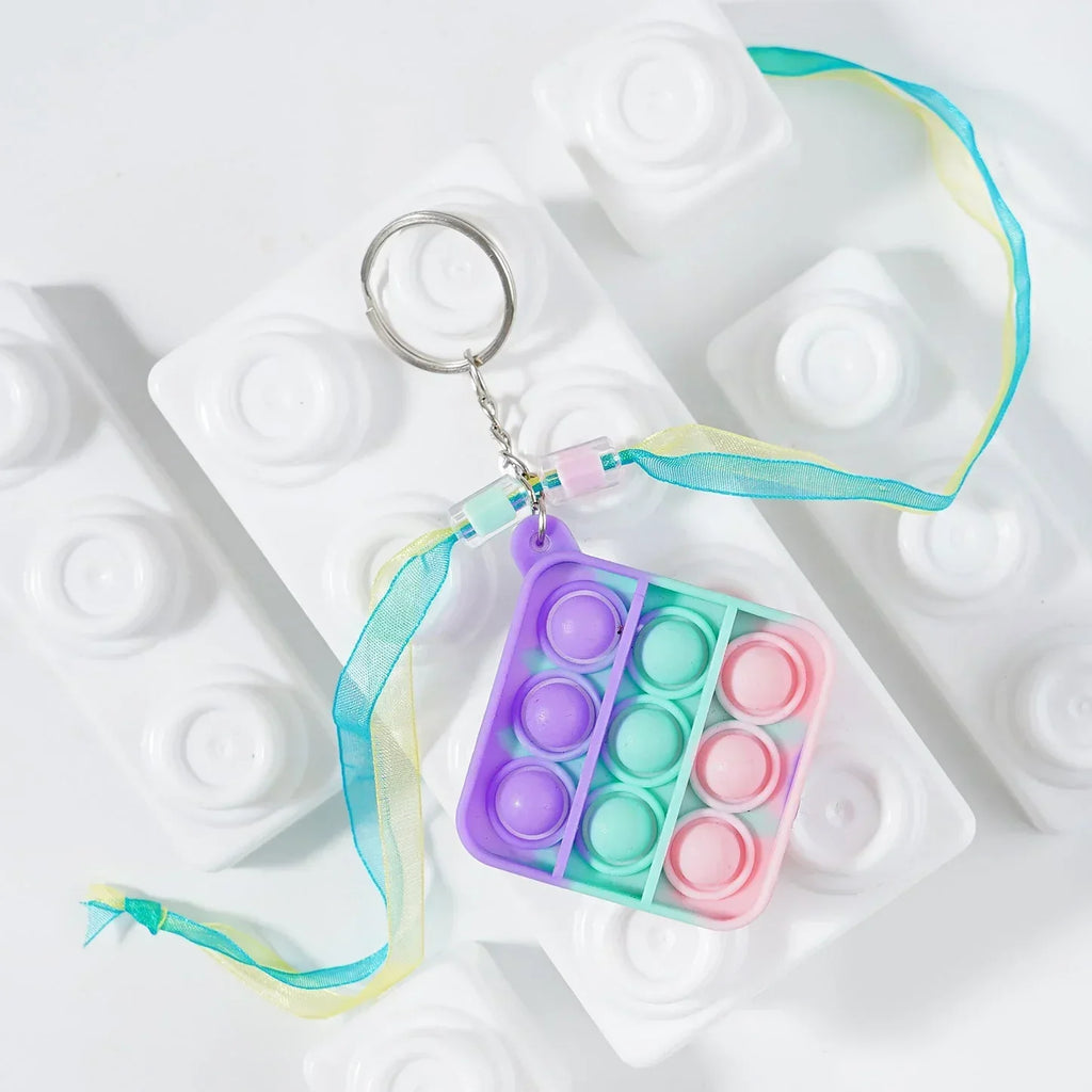 ilearnngrow PopIt Rakhi multiple shapes - Naivri