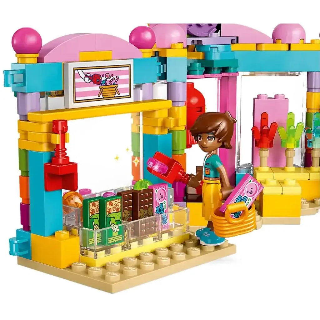LEGO Friends 42649 Heartlake City Sweet Shop – Pretend Candy Store Building Set for Kids 6+, Includes Leo, Alba, Micro Doll, Cat Figure & Candy Accessories – Ideal Gift for Creative Play & Roleplaying Adventures - Naivri
