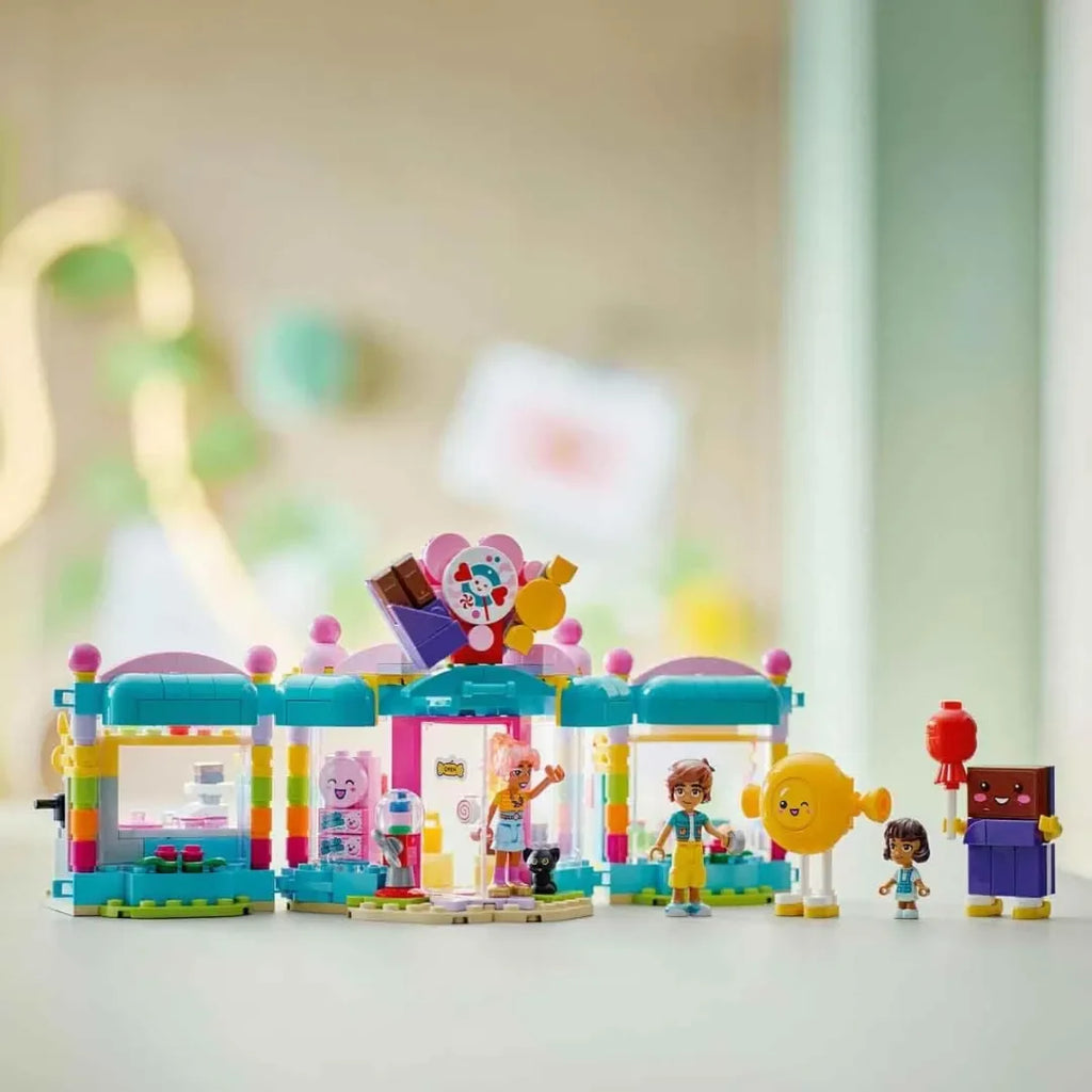 LEGO Friends 42649 Heartlake City Sweet Shop – Pretend Candy Store Building Set for Kids 6+, Includes Leo, Alba, Micro Doll, Cat Figure & Candy Accessories – Ideal Gift for Creative Play & Roleplaying Adventures - Naivri