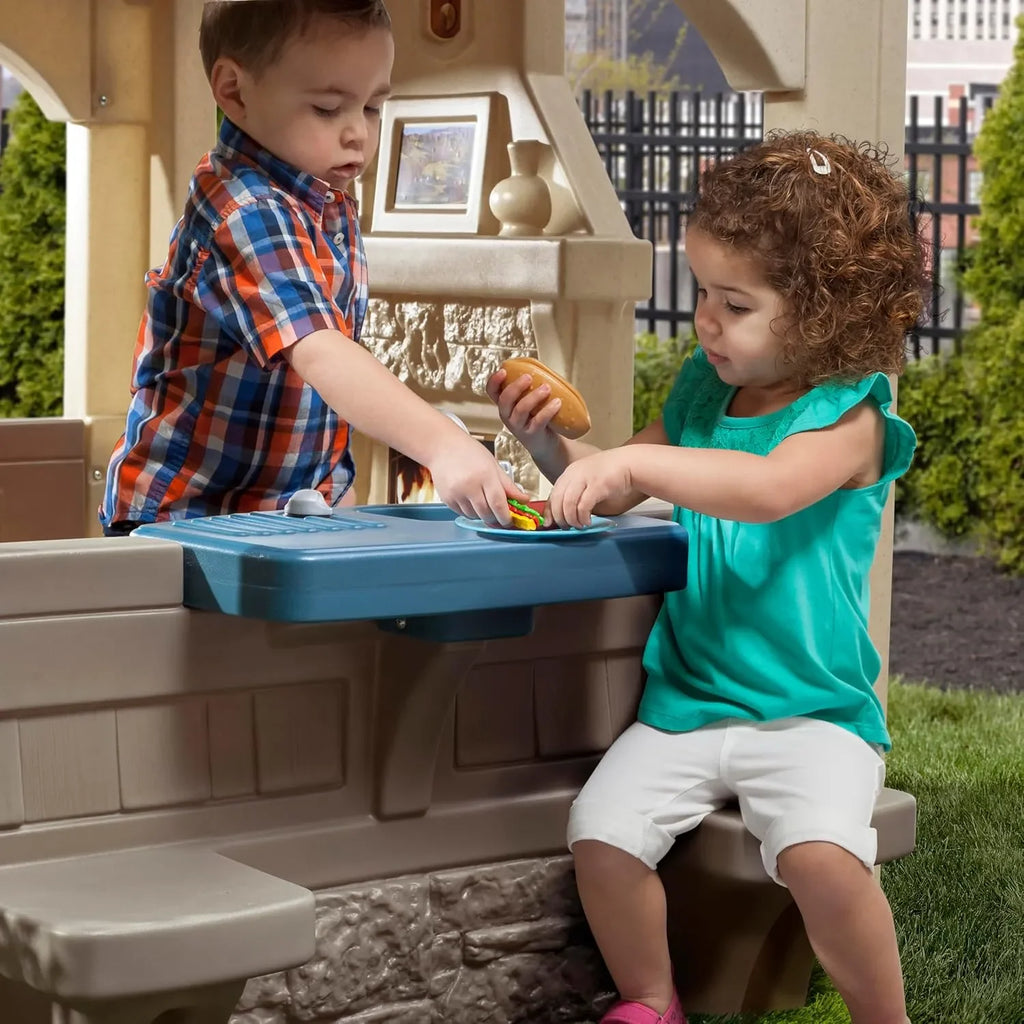 Step2 Charming Cottage Playhouse for Kids – Durable Backyard Playhouse with Working Doorbell, Molded Sink & Outdoor Table | Ages 2-10 - Naivri